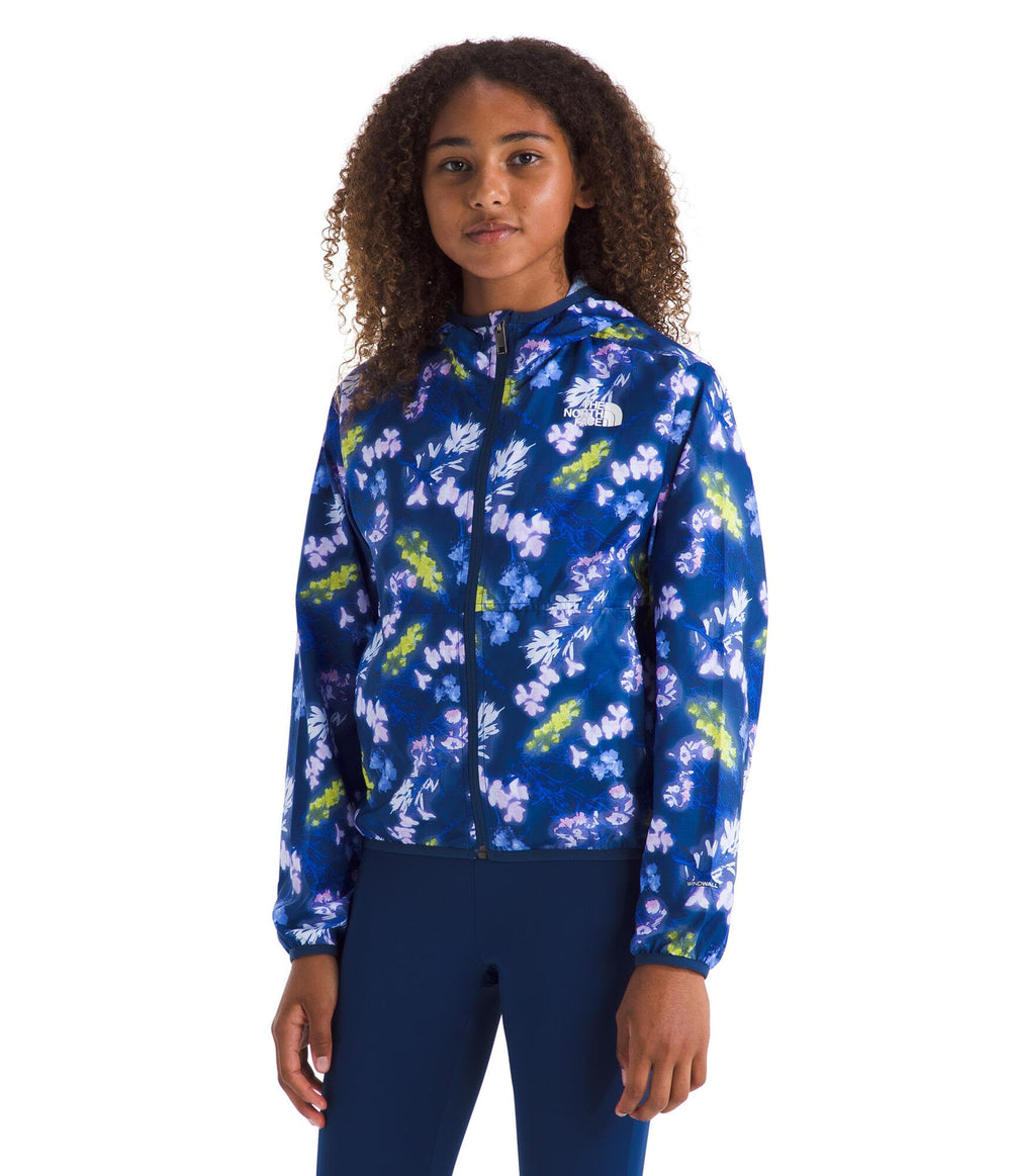 The North Face Girls' TNF Cyclone Wind Jacket front view in Estate Blue floral print for outdoor adventures