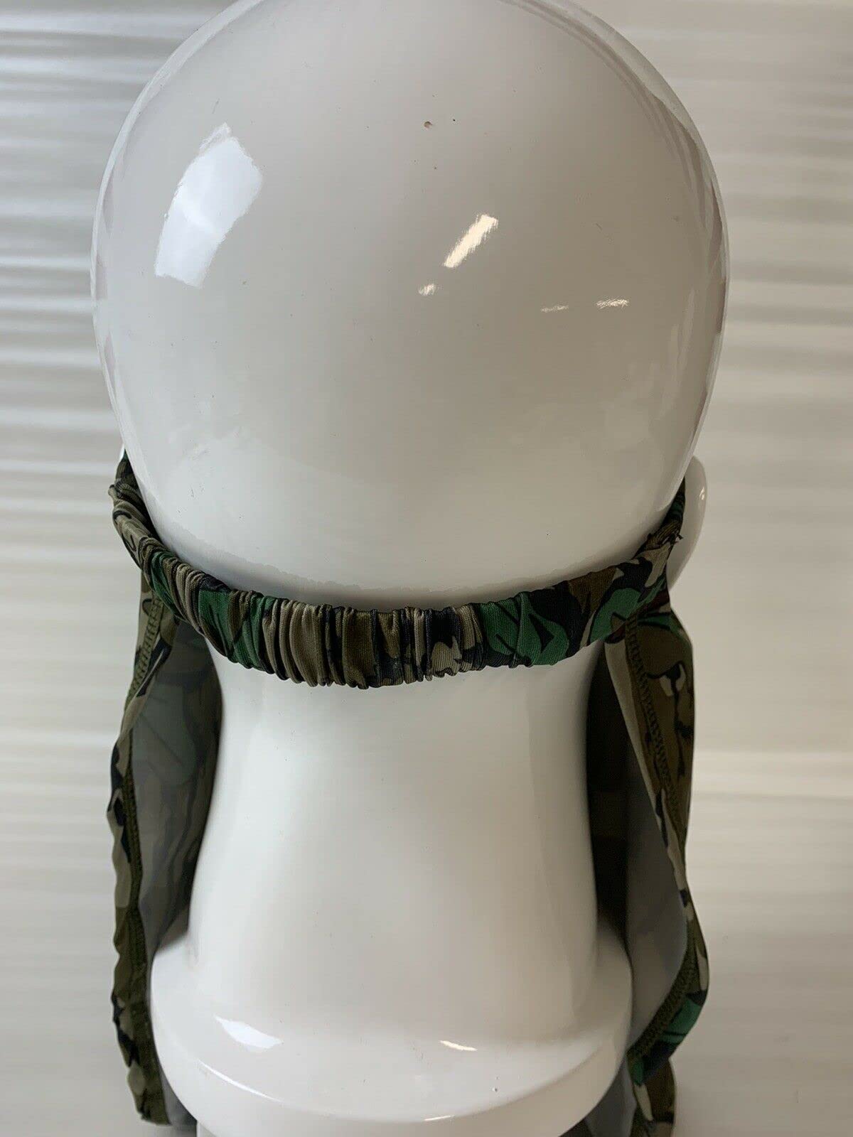 North Mountain Gear Mossy Oak Loose Fit Facemask Greenleaf worn during hunts for concealment