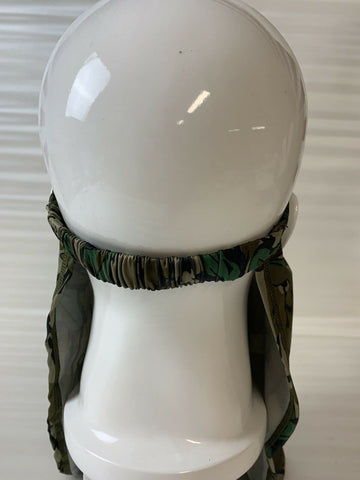 North Mountain Gear Mossy Oak Loose Fit Facemask Greenleaf worn during hunts for concealment