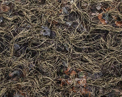North Mountain Gear universal camo netting close-up ghillie texture for woodland brown concealment.