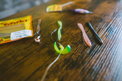 Durable Eye Candy Riggin Leech 6-inch pearl white lure in action on the line