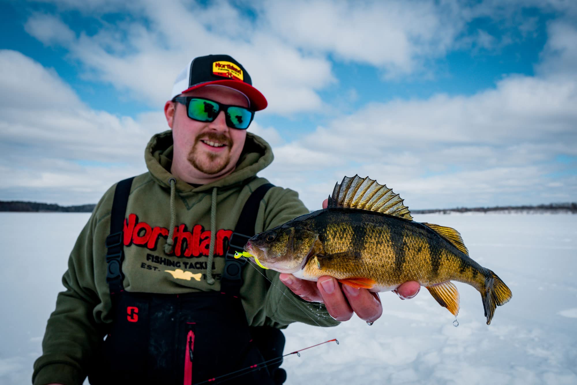 Northland Tackle rigged bloodworm jig with extra tails enables longer ice sessions.