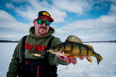 Northland Tackle rigged bloodworm jig with extra tails enables longer ice sessions.