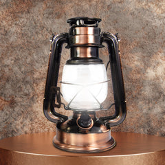 NorthPoint lantern on table top provides versatile outdoor lighting.