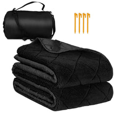 Northroad waterproof camping blanket with Sherpa lining, moisture resistant for damp outdoor picnics.