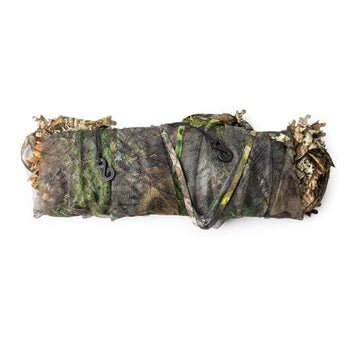 Nukem Stake loops and brush camouflage enhance field concealment.