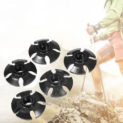Nunafey trekking pole basket rubber on the ground shows a wide contact area for soft terrain.