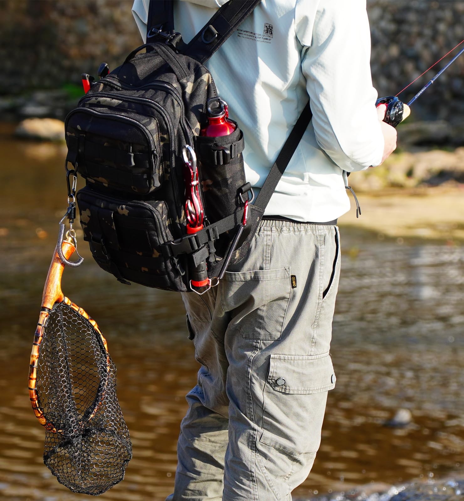 Close-up of rod holder and front pockets on Nuoviyiya backpack