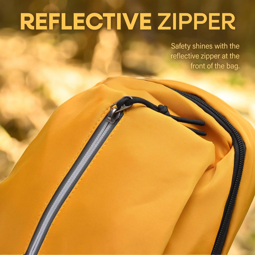Nupouch yellow crossbody middle pocket fits a 24 oz water bottle securely.