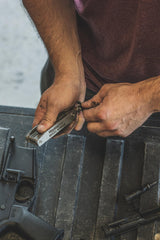 Nylon belt sheath included for convenient carry