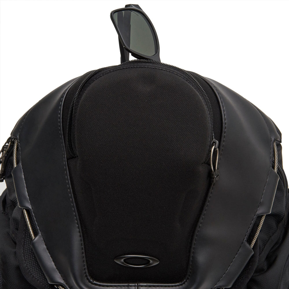 Oakley Kitchen Sink Backpack stealthblack top media pocket protects devices on the go.