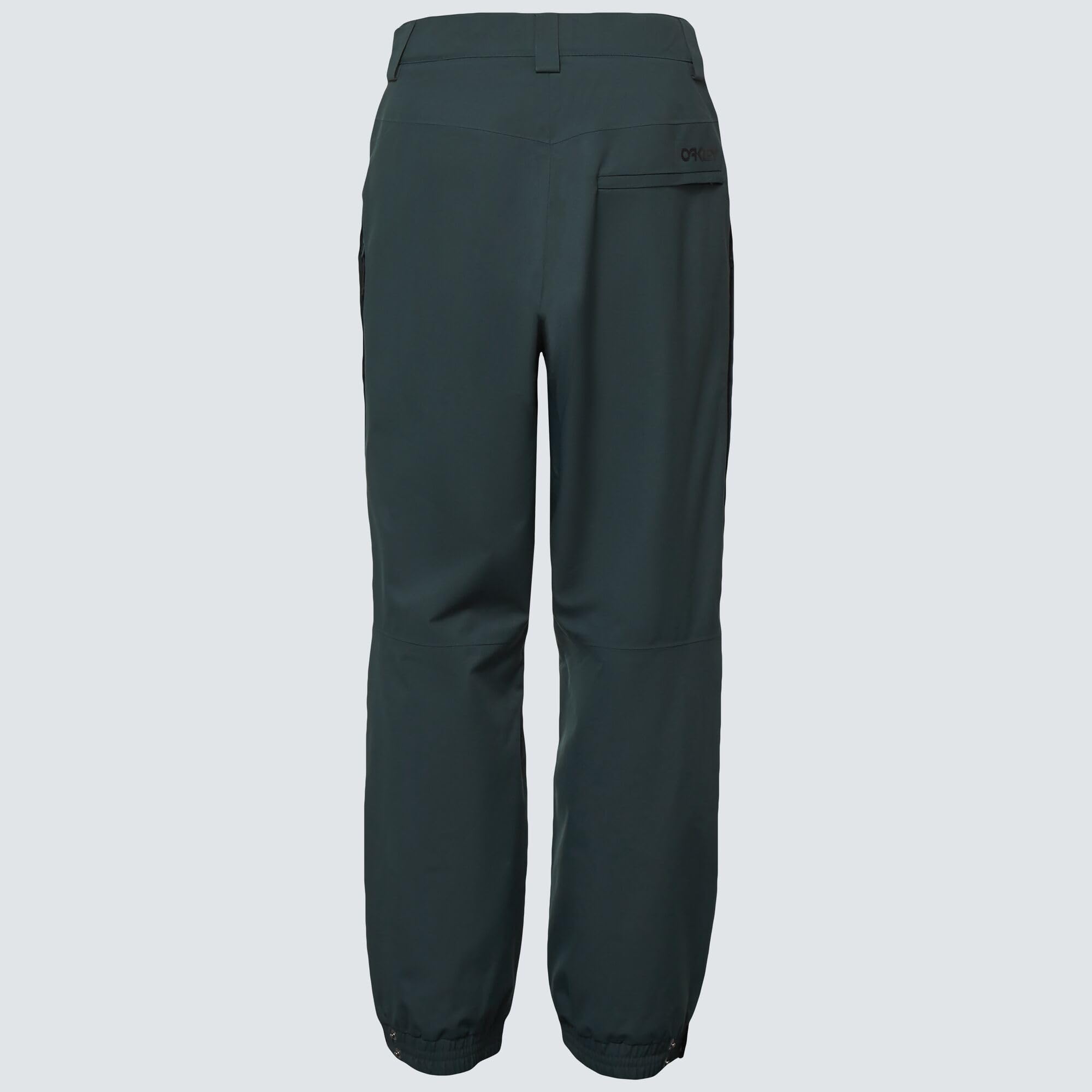 Oakley TNP Evoke RC Shell Pant waist adjustment highlights customizable fit during activity.