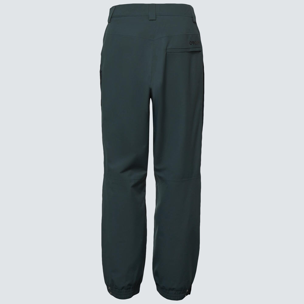 Oakley TNP Evoke RC Shell Pant waist adjustment highlights customizable fit during activity.