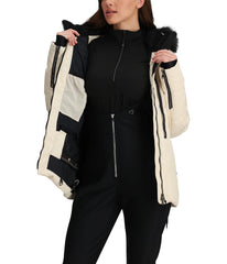 Obermeyer Circe Down Jacket Sahara 14 pocket detail featuring zip pockets and pass pocket