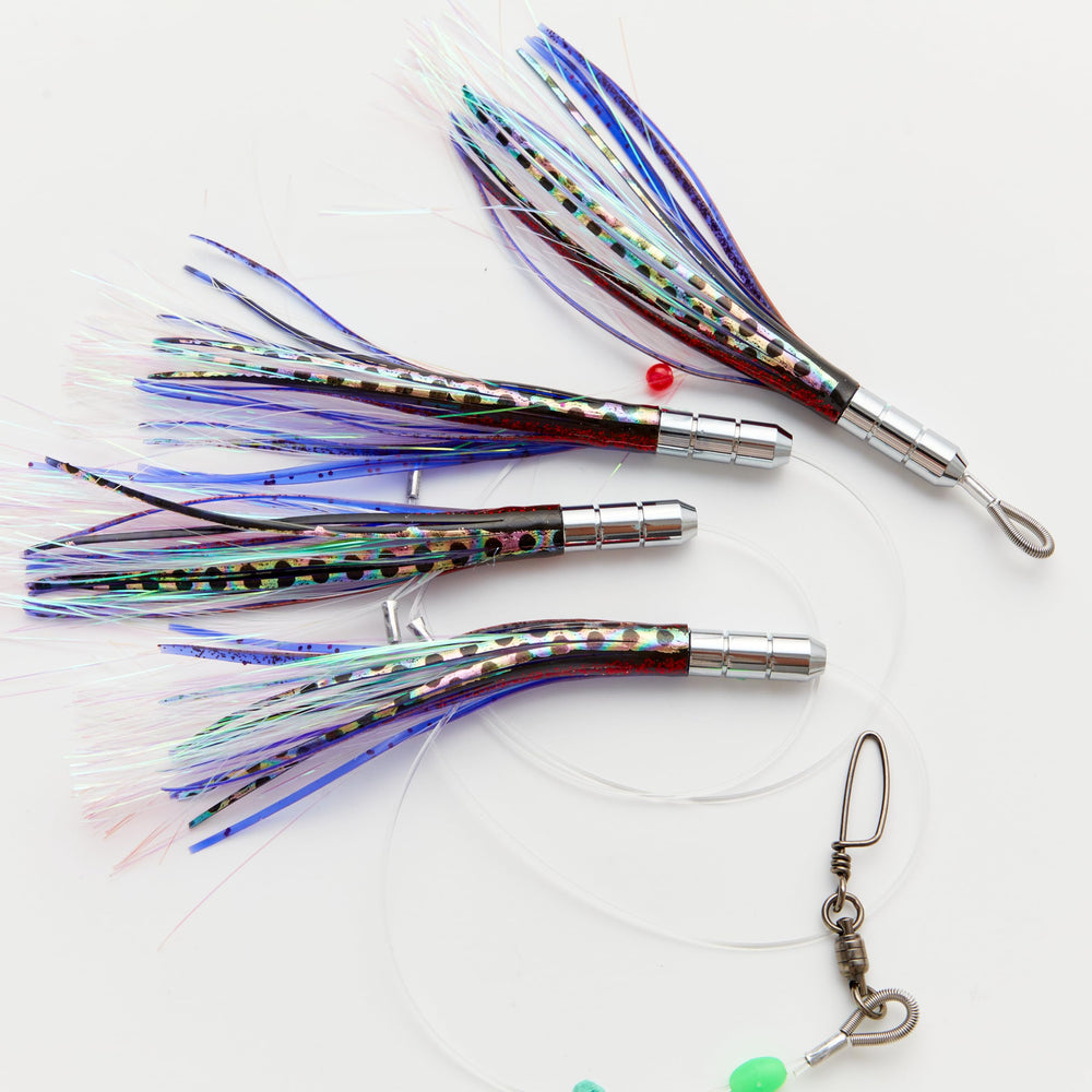 Ocean Cat feather teasers with soft rubber skirt attract multi-species fish