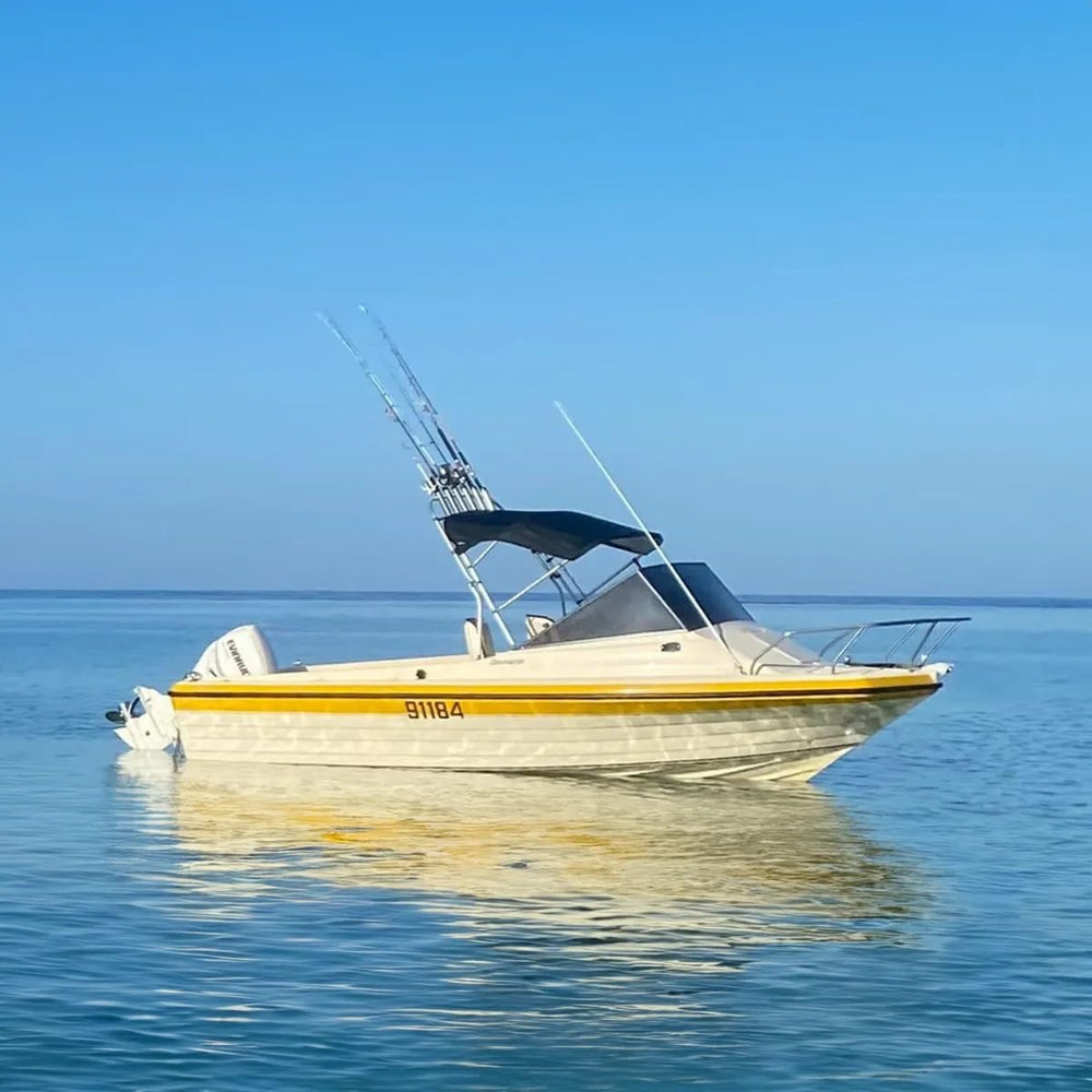 Oceansouth clamp-on fishing rack shows cast aluminum double-knuckle clamp in action.