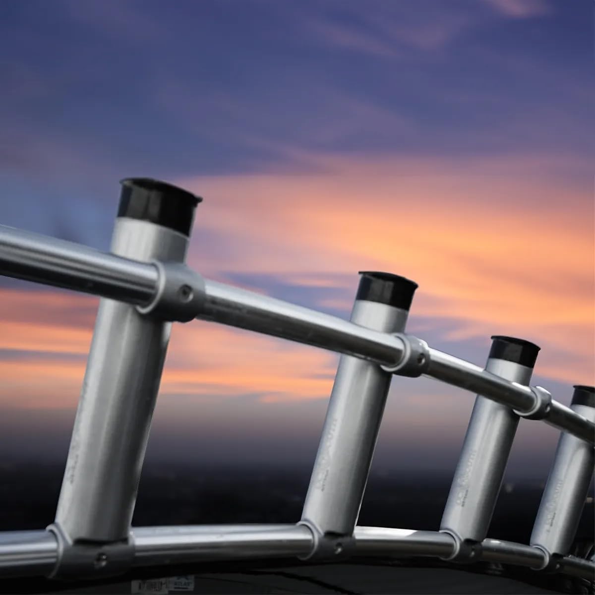 Oceansouth clamp-on fishing rack demonstrates durable polymer rod holders on marine frame.