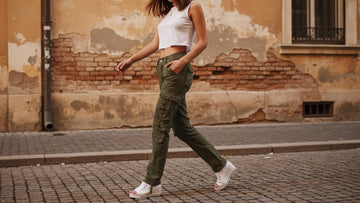 OCHENTA baggy cargo pants shown in side view with relaxed styling
