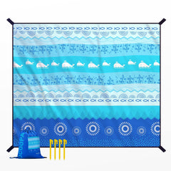 OCOOPA beach blanket 10x9 size offers roomy comfort for family beach days.