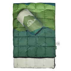 ODESUN down-alternative blanket folded in its carry case for compact travel.
