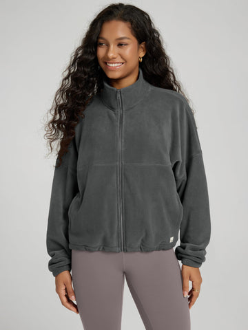 ODODOS cinchable hem fleece jacket demonstrating adjustable drawcord for fit options.