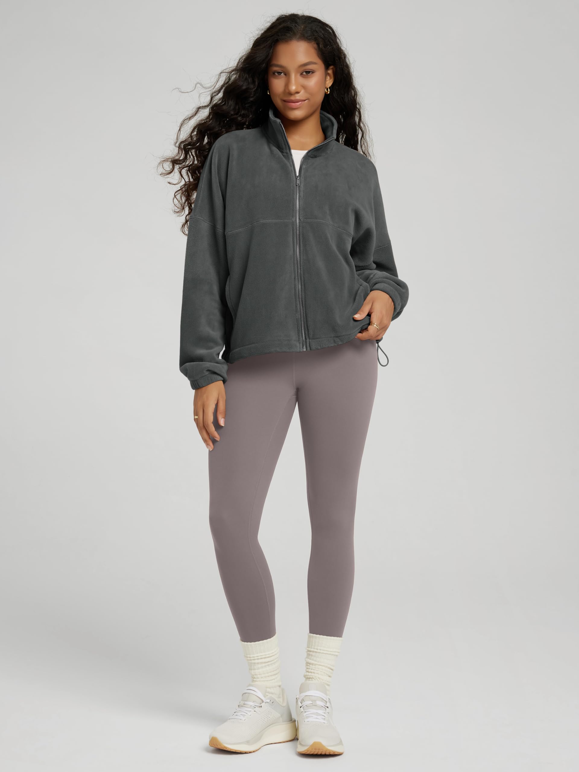 ODODOS fleece jacket with elastic cuffs and deep pockets for everyday practicality.