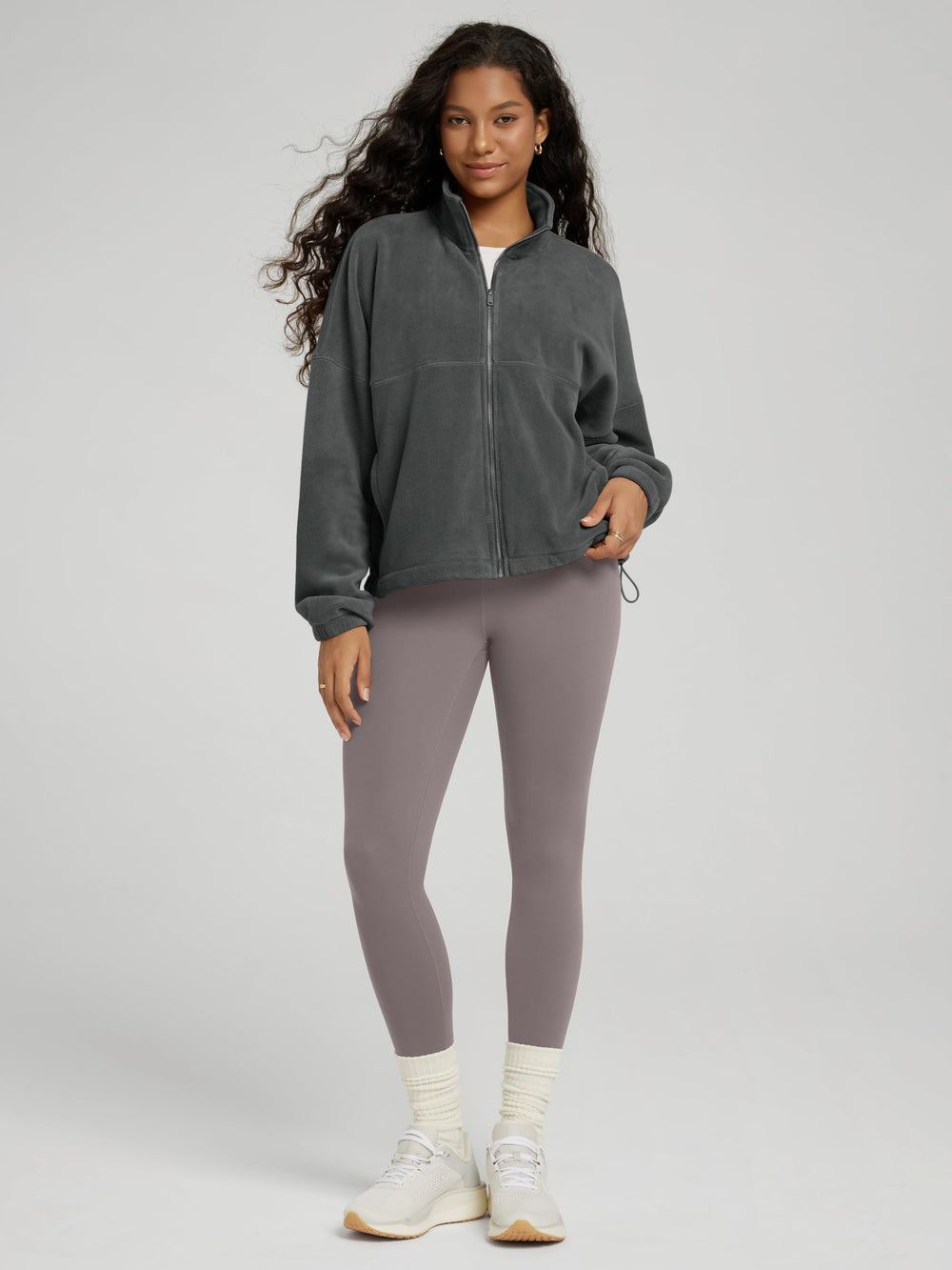 ODODOS fleece jacket with elastic cuffs and deep pockets for everyday practicality.
