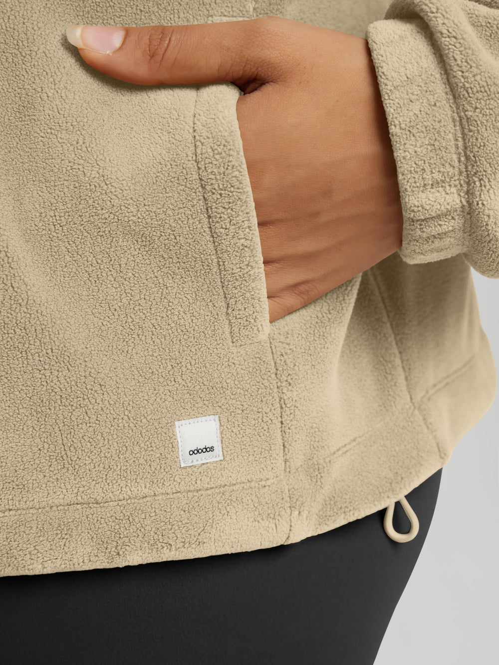 ODODOS fleece jacket with deep pockets for hands and essentials.