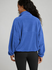ODODOS polar fleece jacket stand-collar close-up highlighting warmth and comfort.