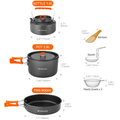 Odoland kettle boiling water outdoors on a trail.