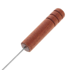 Close-up of tool showing compact size and handle