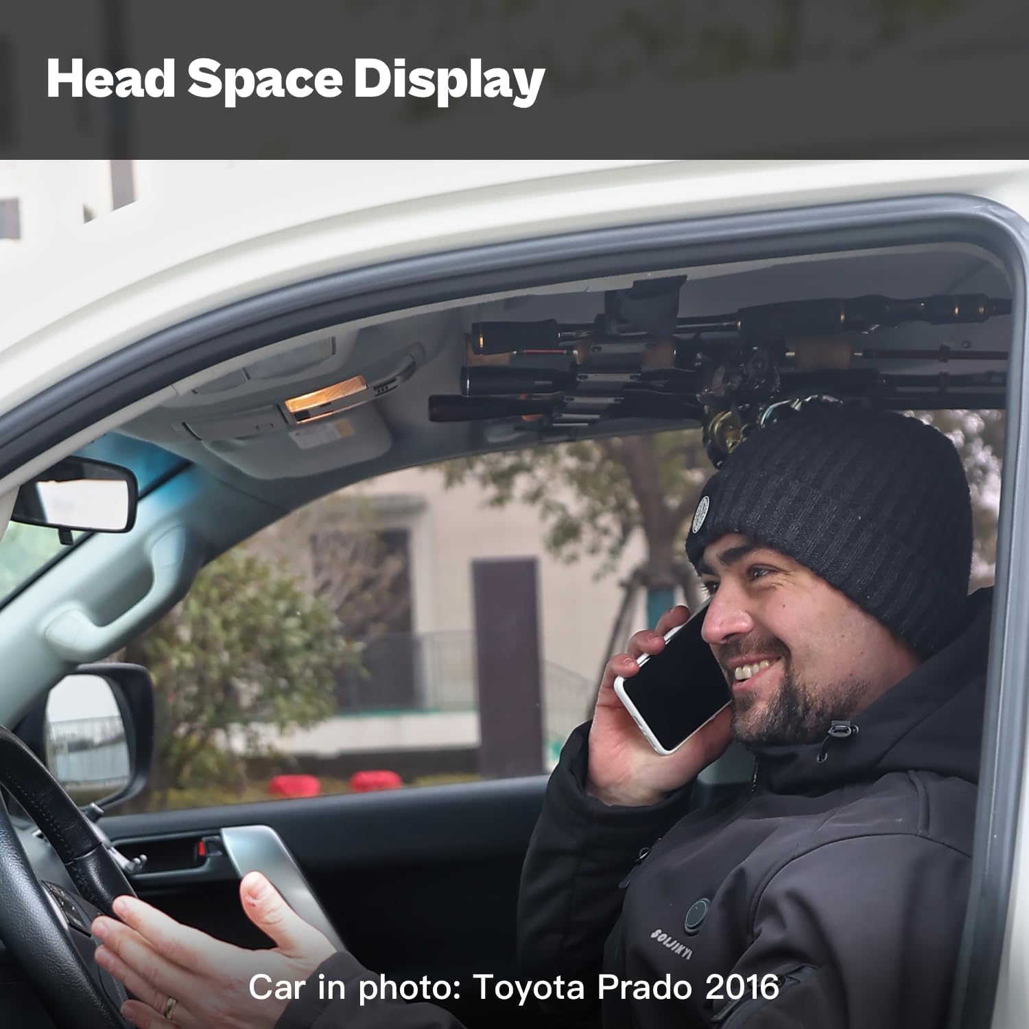 Rods positioned close to the car roof to maximize head space while reels stay behind