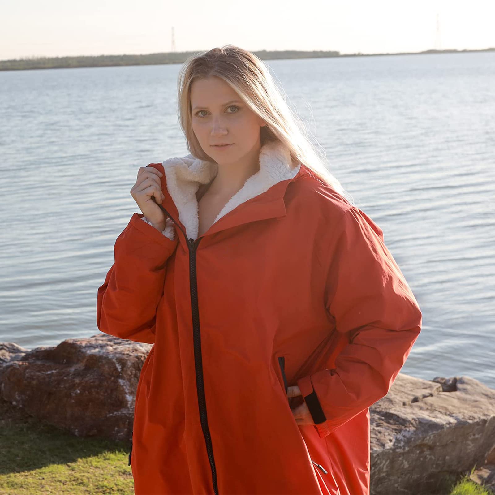Oksun Swim Parka demonstrates versatile use for beach, surf, or outdoor activities.