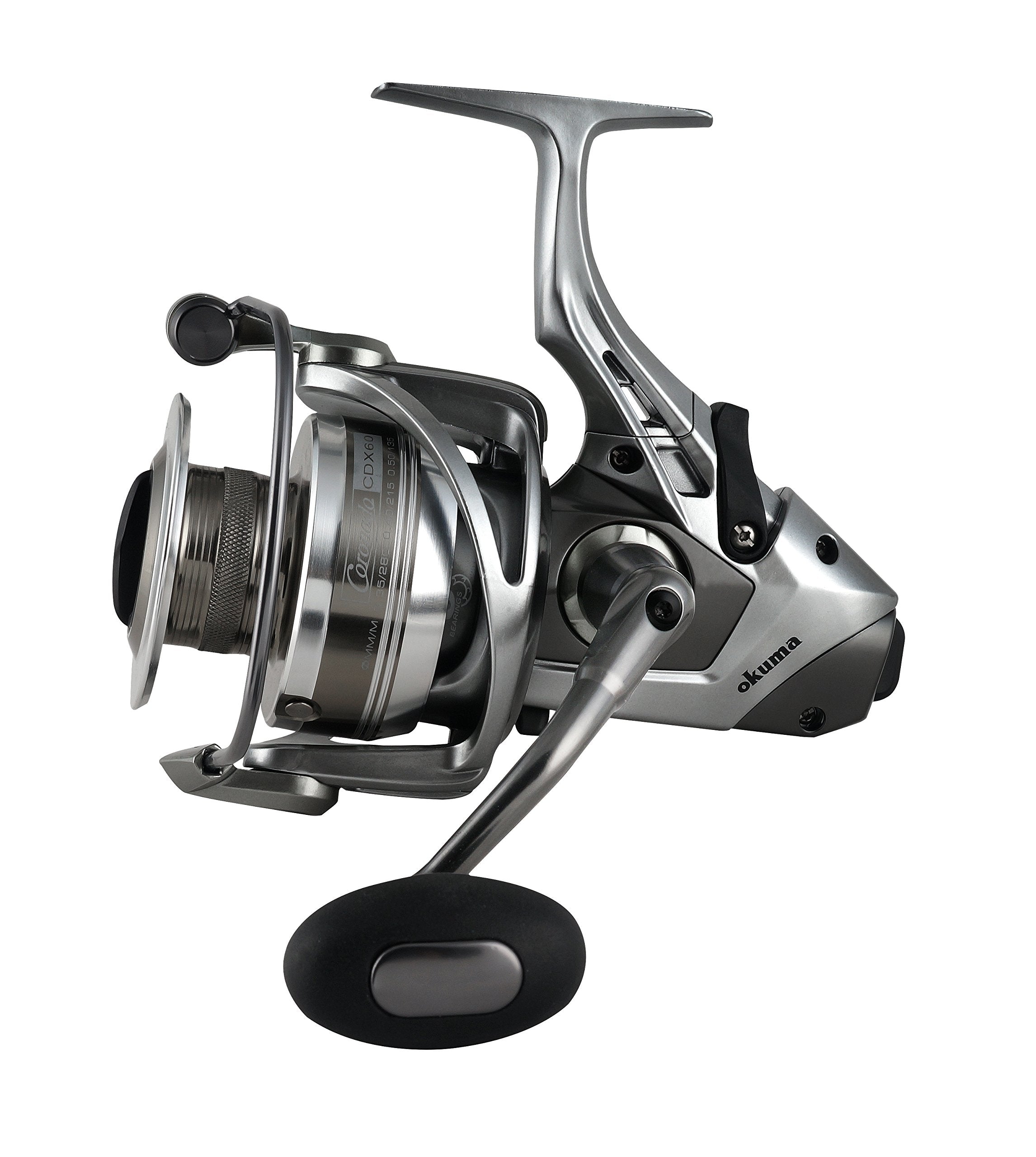 Okuma CDX-55 Coronado spinning reel close-up highlighting durable aluminum stainless steel construction.