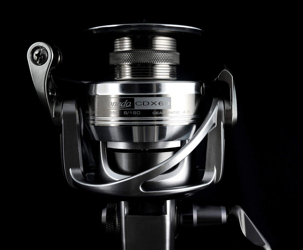 Okuma CDX-60 Coronado ambidextrous handle in use for left or right-handed anglers.