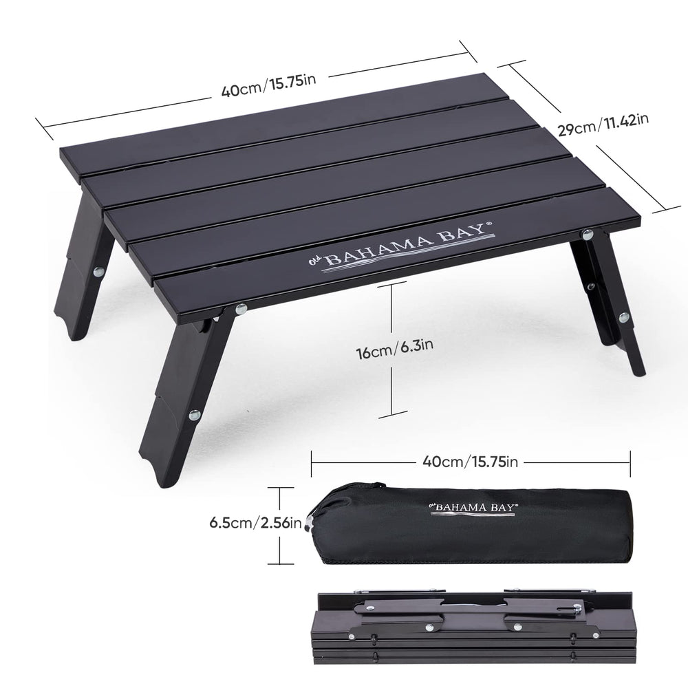 Old Bahama Bay Ultralight Mini Table with adjustable legs on uneven ground for level setup.