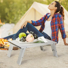 Old Bahama Bay Ultralight Mini Table legs extended to stabilize on rocky terrain