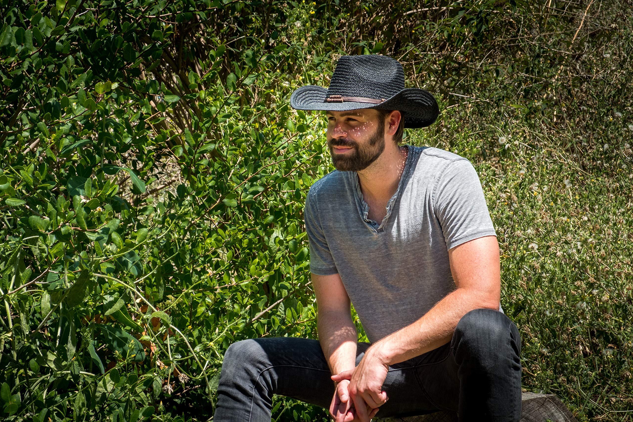 Old Stone Chloe Black straw cowboy hat outdoor setting on the move