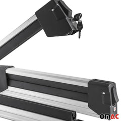 OMAC locking system closeup emphasizes secure transport of skis or boards.