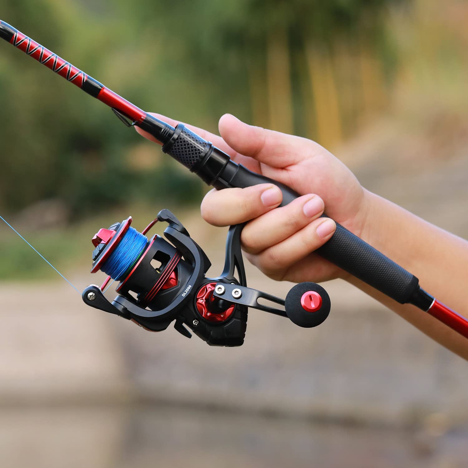 One Bass spinning-rod-in-action-pier-casting shows versatile inshore to light offshore use
