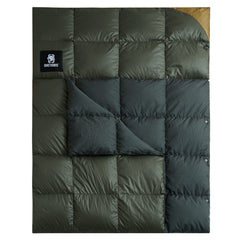 OneTigris down camping blanket used as top-quilt in a tent for extra warmth.
