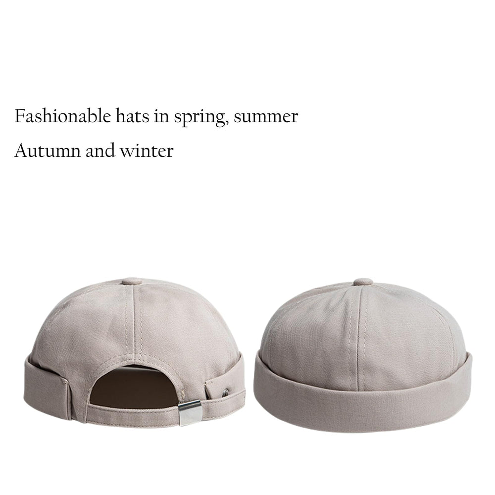 Side view showing rolled cuff on brimless harbour hat