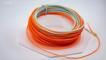 OPST Smooth Integrated running line in orange offers high visibility for controlled casting.