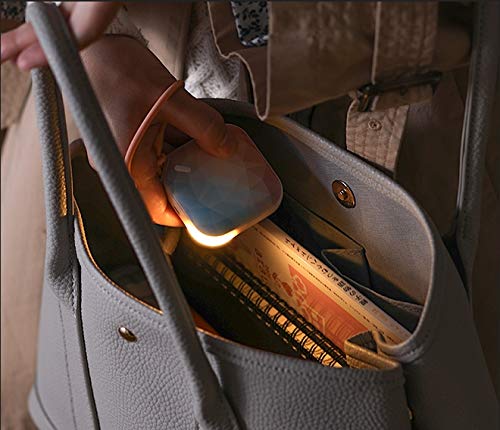 Orastone Hand Warmer in use: double-sided warmth for consistent comfort.