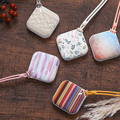 Orastone hand warmer knit side view highlights compact design for pocket carry.