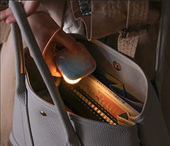 Orastone rechargeable hand warmer side profile highlights its slim, ergonomic shape for easy grip