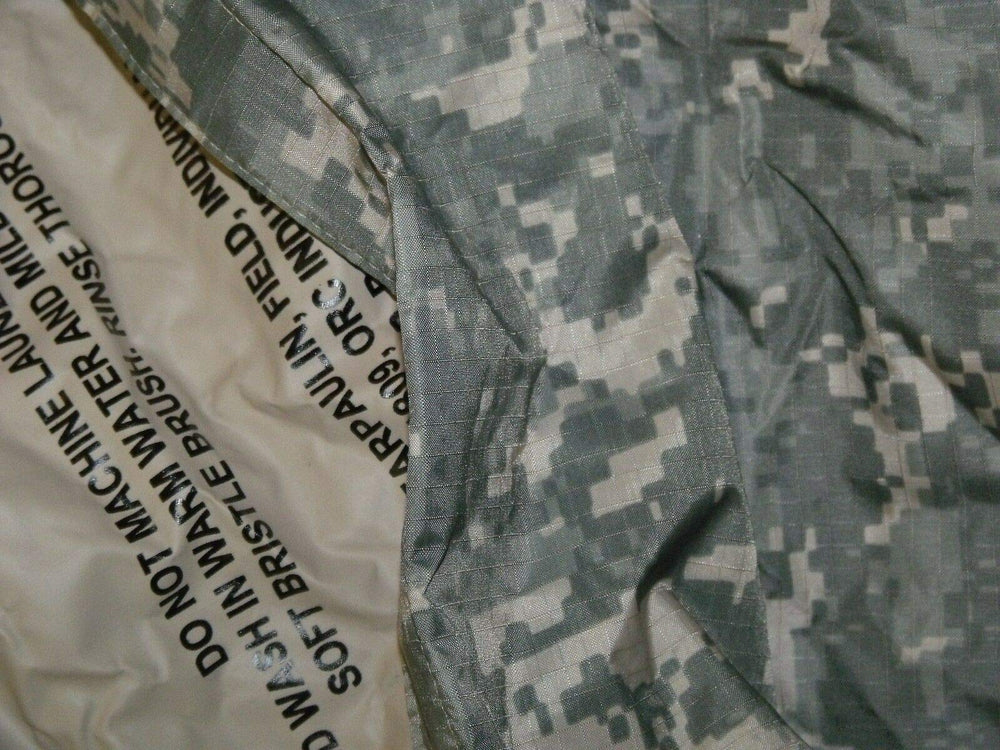 ORC USGI tarp ACU foliage sand packed in trunk, lightweight and portable.