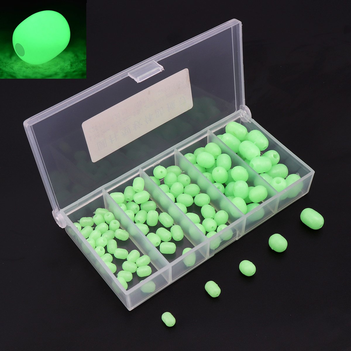 Green luminous soft plastic fishing beads in a plastic box