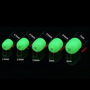 Close-up of glow-in-the-dark bead with center hole