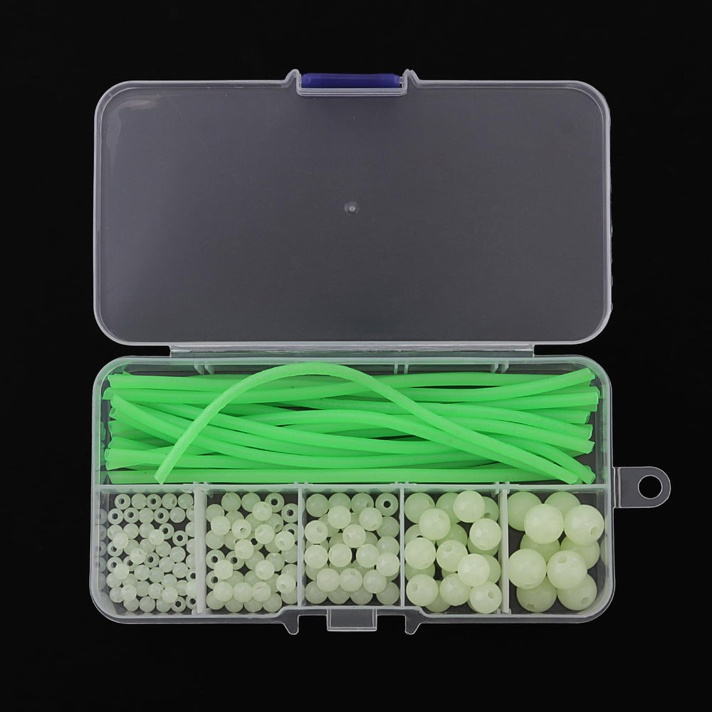 Luminous beads threaded onto a fishing line for a rig